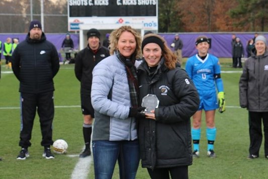 NSIC Commissioner Erin Lind and Elite 18 Winner Anna Fobbe of Bemidji State